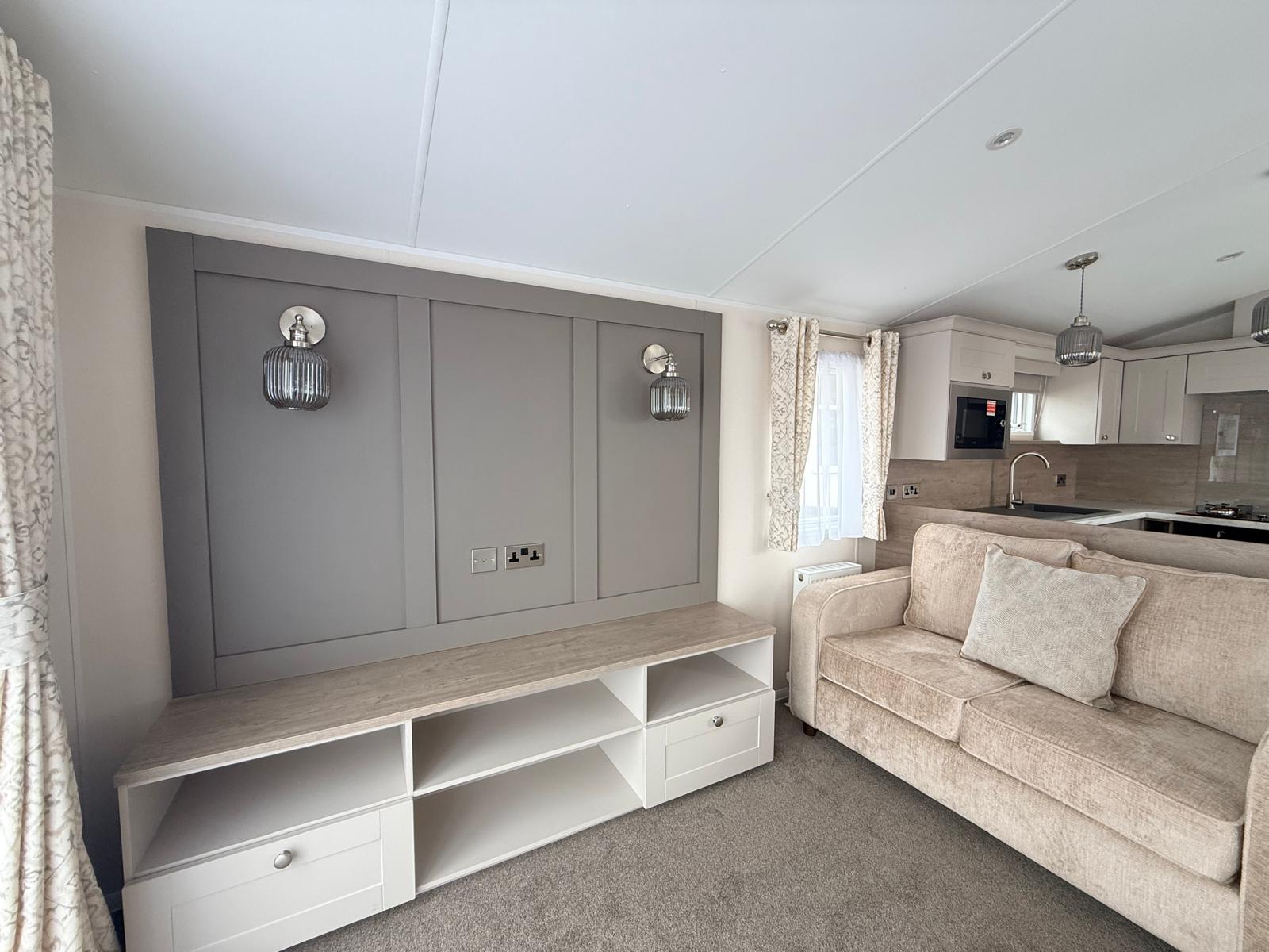 Picture showing the media wall area for this 2027 Willerby Salisbury. Mounting points, power sockets ready too receive a large flat screen TV.