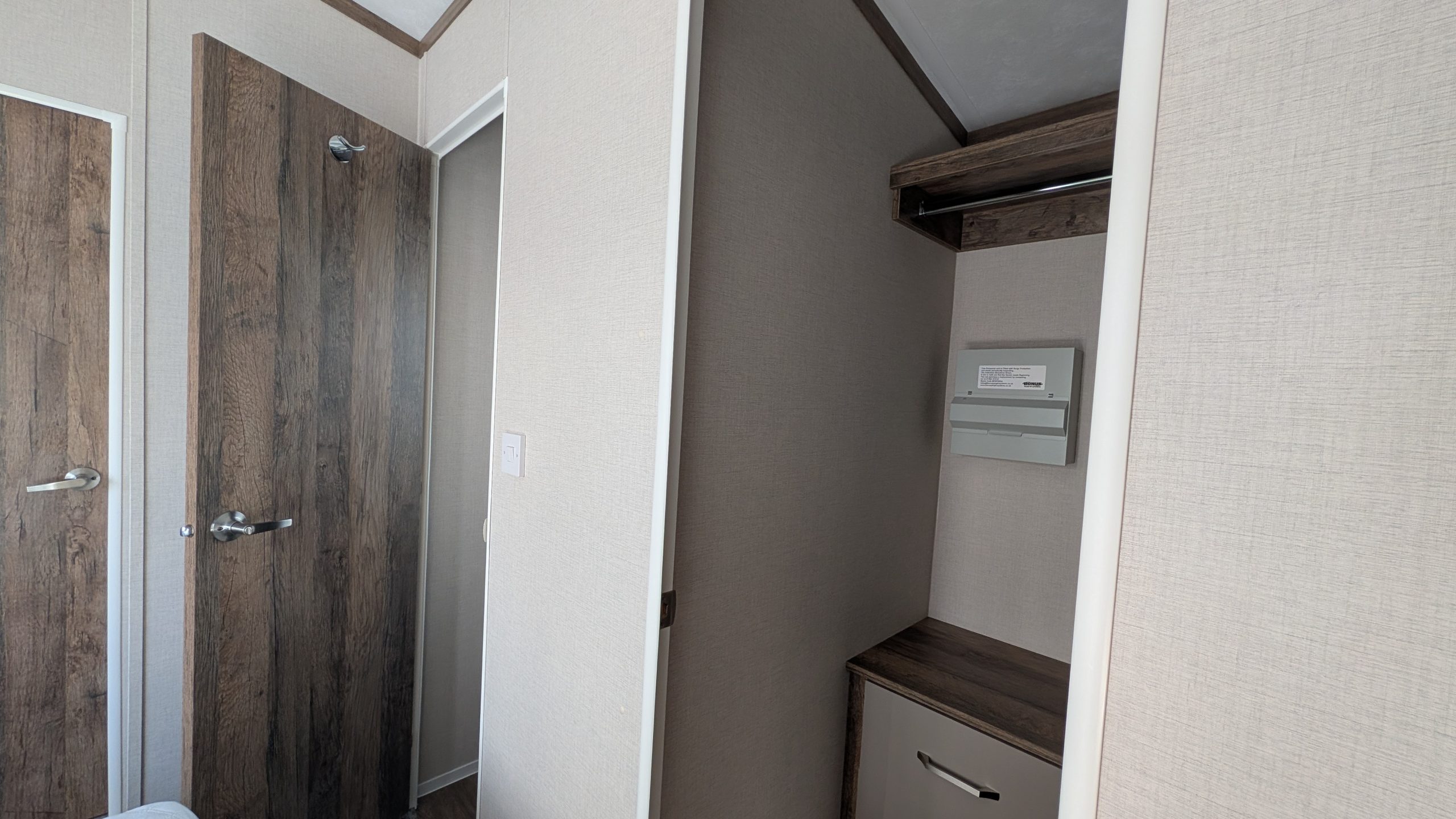 Master walk-in wardrobe and ensuite in Pemberton Elite at Tarn House