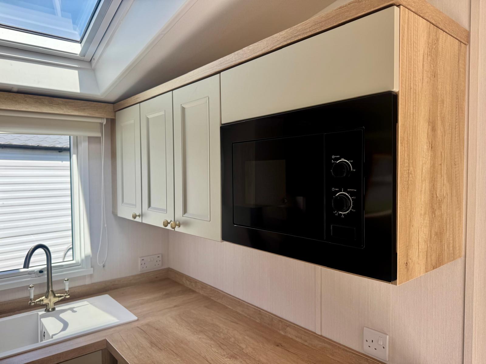 Microwave in the Swift Provence 2025 caravan at Windy Harbour Holiday Park