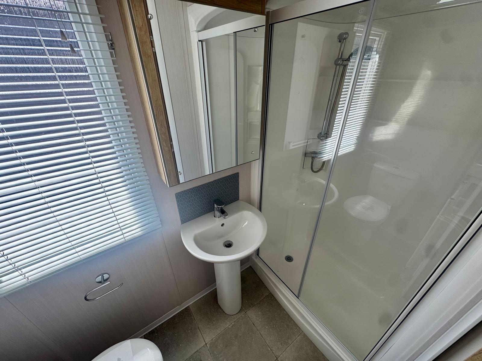 Family bathroom in the Swift Provence 2025 caravan at Windy Harbour Holiday park