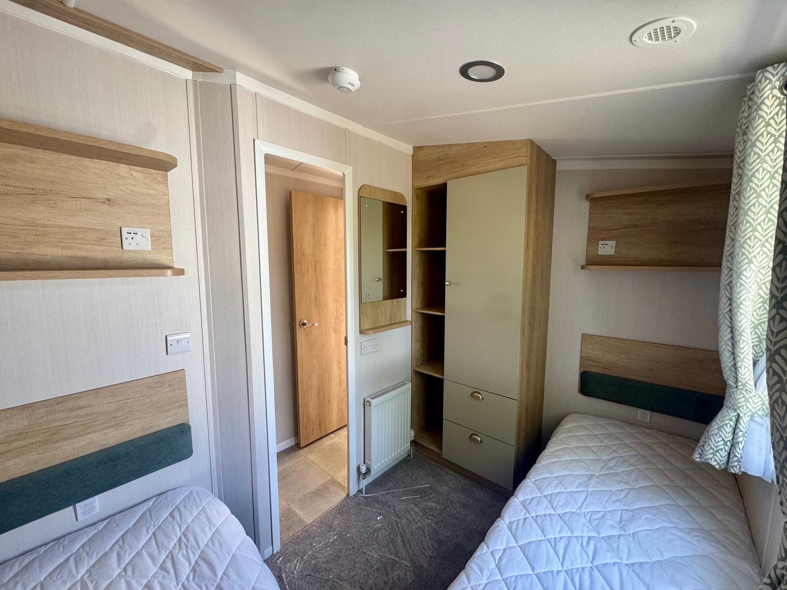 Twin bedroom in the Swift Provence 2025 caravan at Windy Harbour Holiday park
