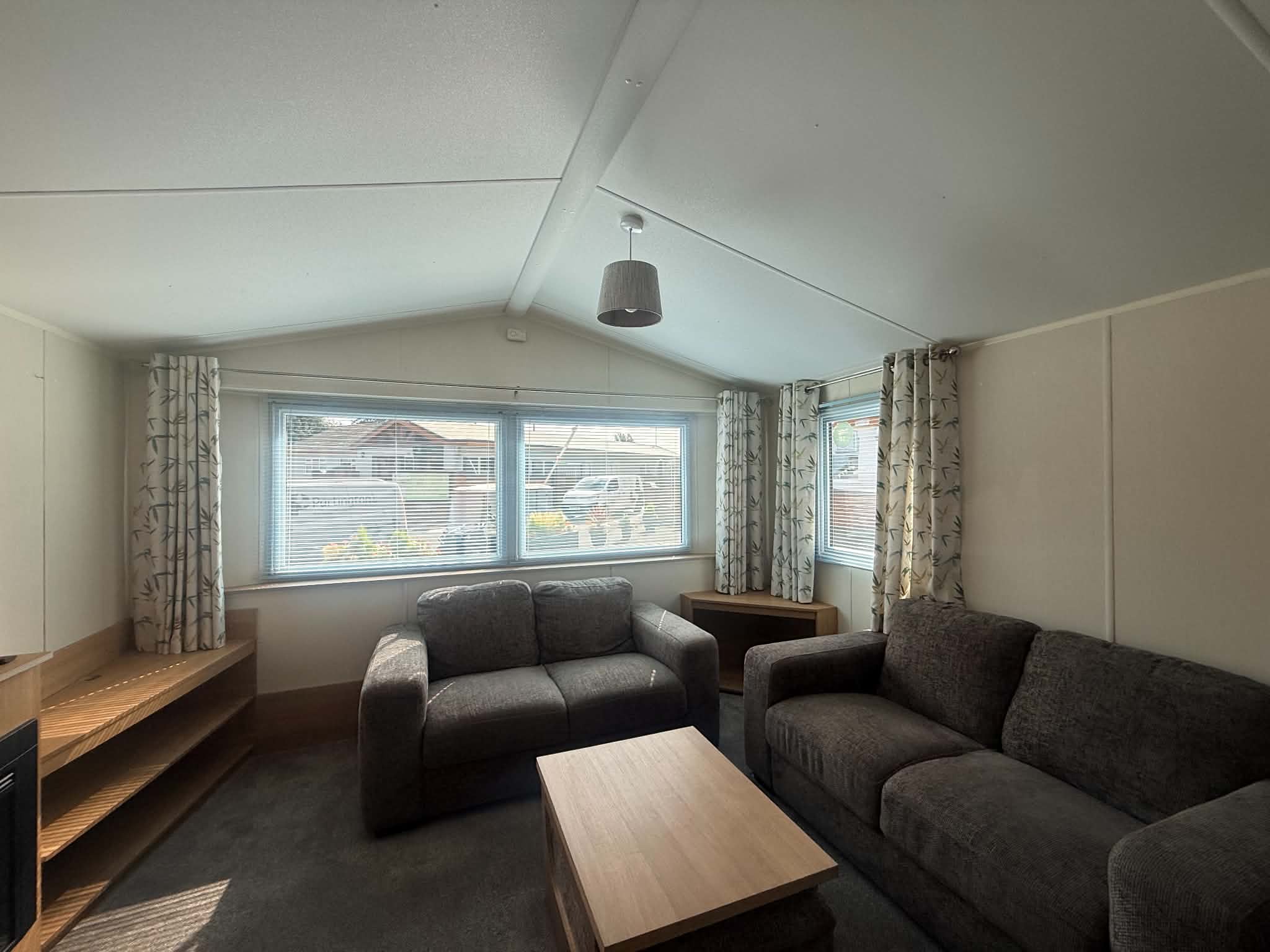 Another view of the Willerby Mistral 2017 lounge area, with the large, bright front window.